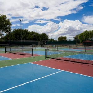 Tennis court with green, red, and blue coloring