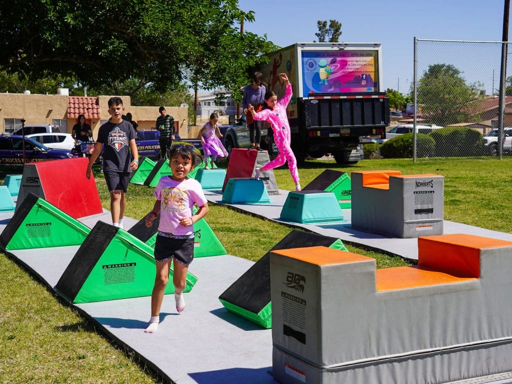 Children playing on an obstacle course