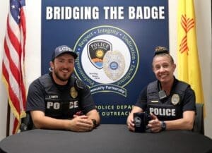 Las Cruces Police Department officers prepare for a Bridging the Badge broadcast.