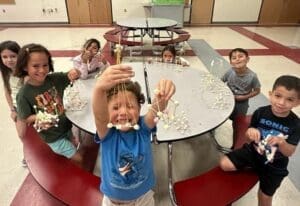 Children playing at a table