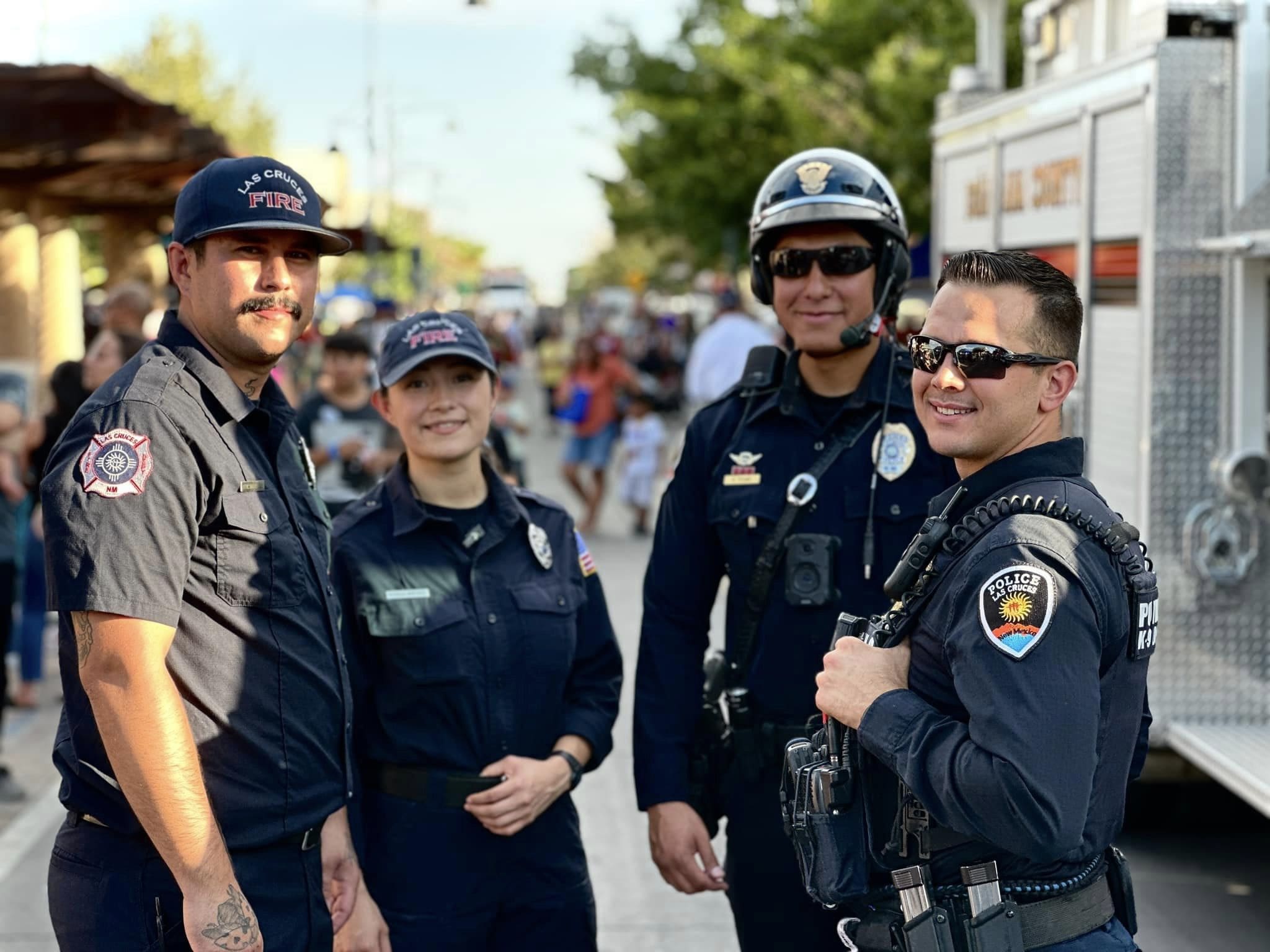 Firefighters and police officers standing during National Night Out