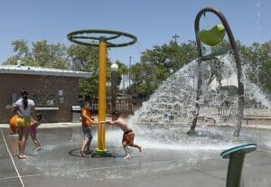 Children playing at the splash pad