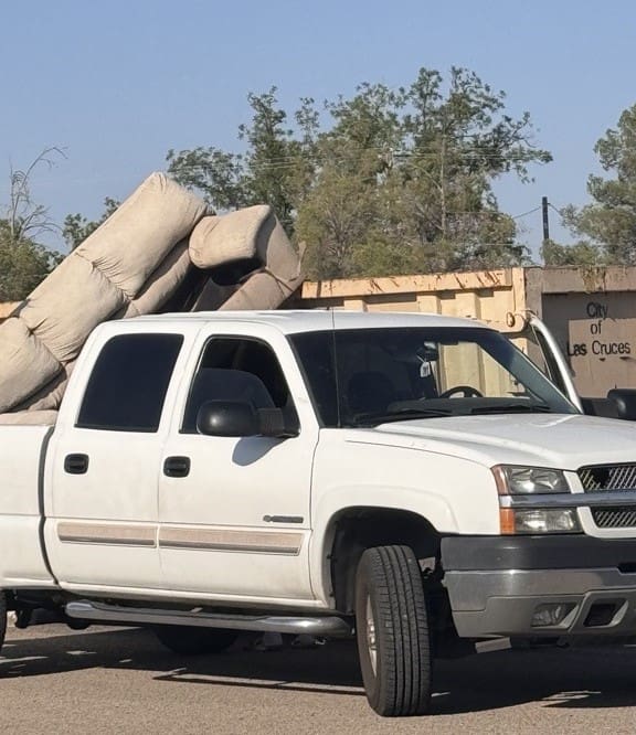 Truck by a dumpster