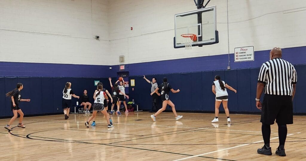 Youth playing basketball