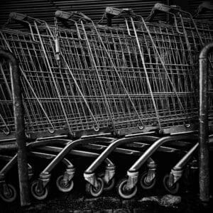 Set of shopping carts view from the side in black and white