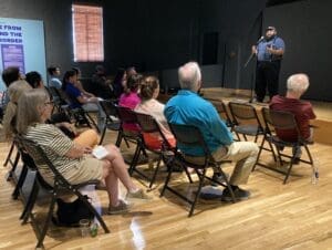 Man Speaking to Audience