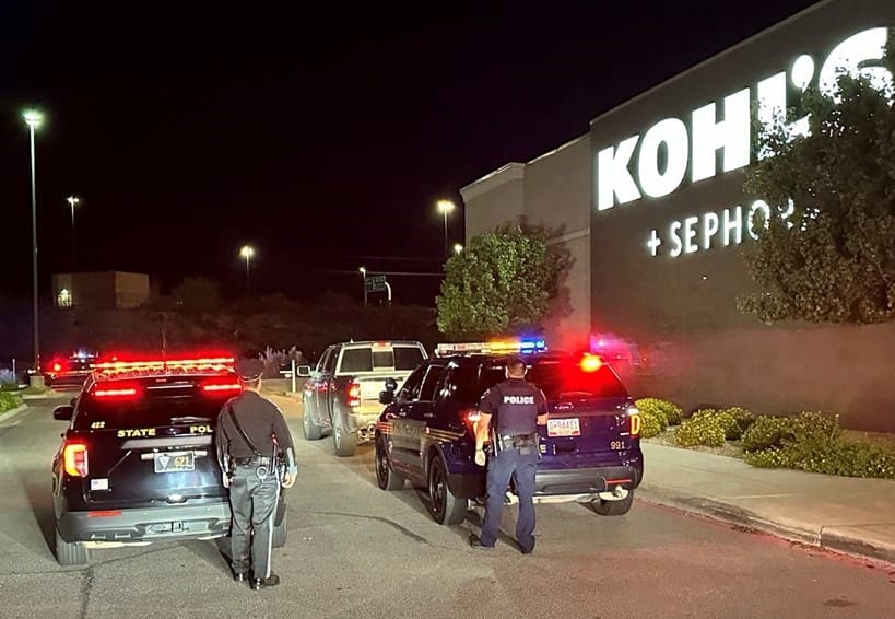 Police Officers in front of store