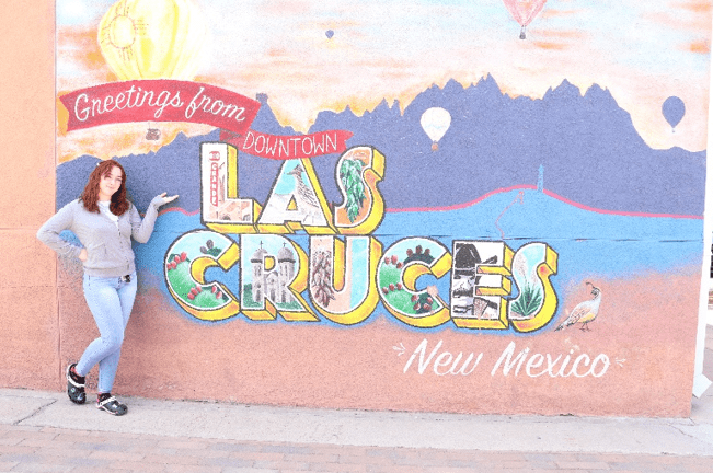 Megan in front of Color Las Cruces mural