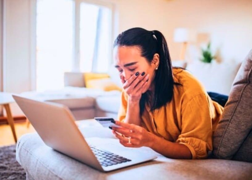 Lady looking at a laptop