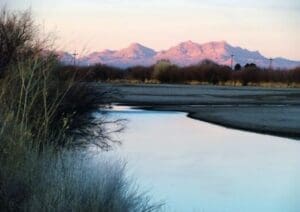 River in front of mountains