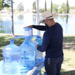 guy pumping water