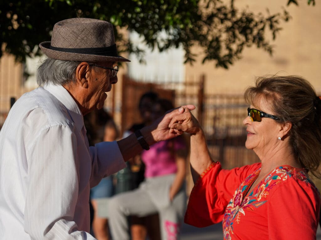 Couple dancing at plaza de las cruces