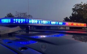 Police lights flashing in the night.