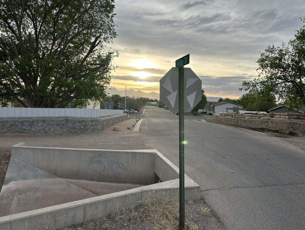 A stop sign in front of a street.
