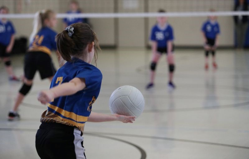 Children playing volleyball.