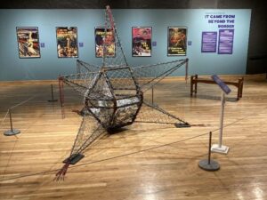 Wire sculpture in the middle of a room.