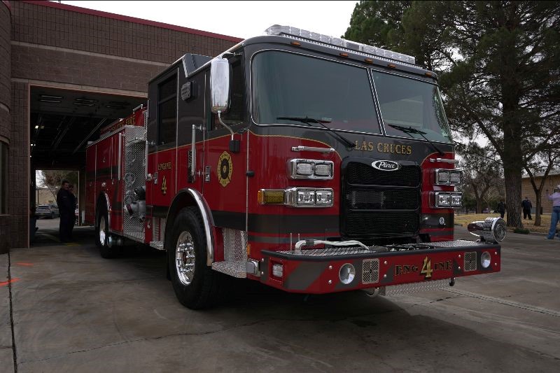 Fire truck parked at a fire station.