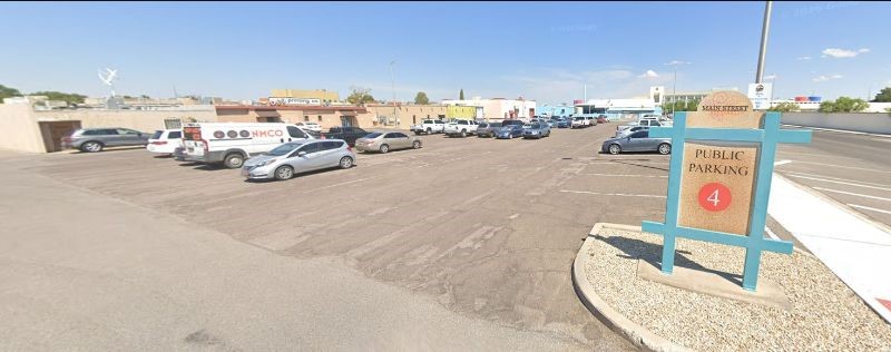 Cars parked in a parking lot.