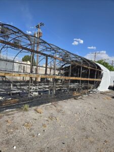 photo of a greenhouse on fire