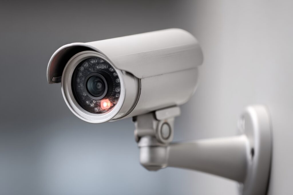 Security camera attached to a wall.